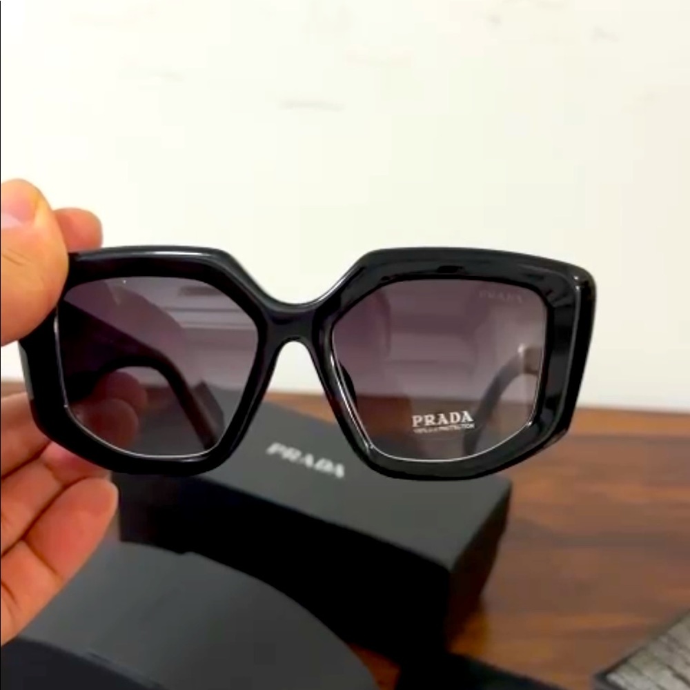 Prada sunglasses. Never worn.